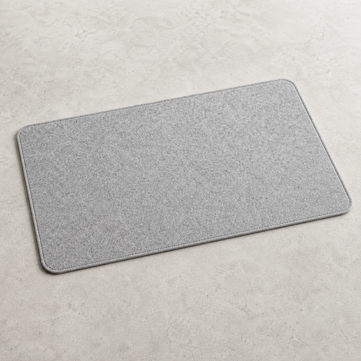 Realistic studio product card for Eldaro Desk Mat, a fictional gadgets item.