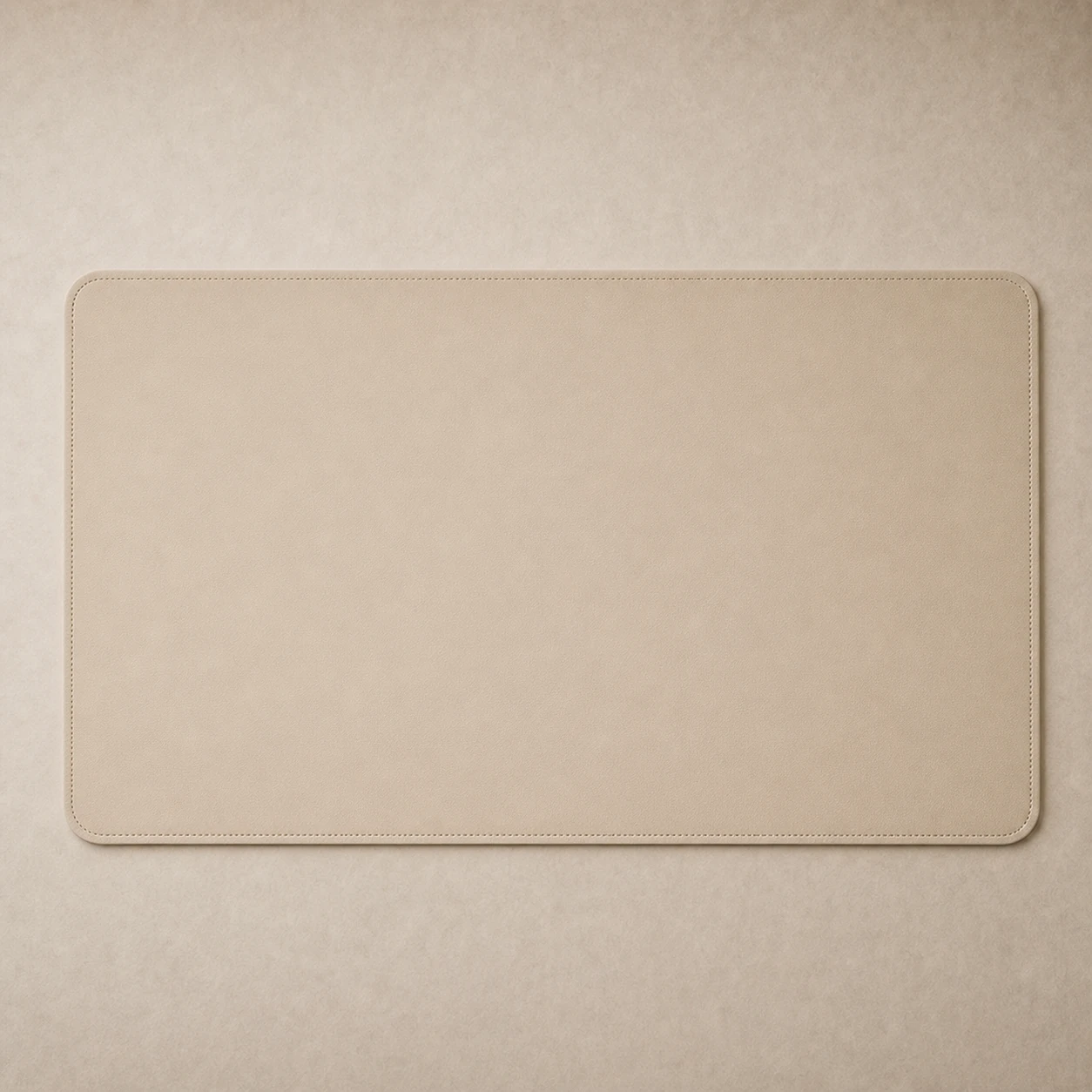 Realistic studio product card for Inka Desk Pad, a fictional stationery item.